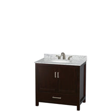 Load image into Gallery viewer, Wyndham Sheffield 36 Inch Single Bathroom Vanity in Espresso, White Carrara Marble Countertop, Undermount Oval Sink, and 24 Inch Mirror- Wyndham